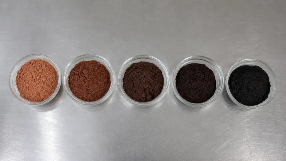 Cocoa powder color scale from natural brown to jet black by alkalization level
